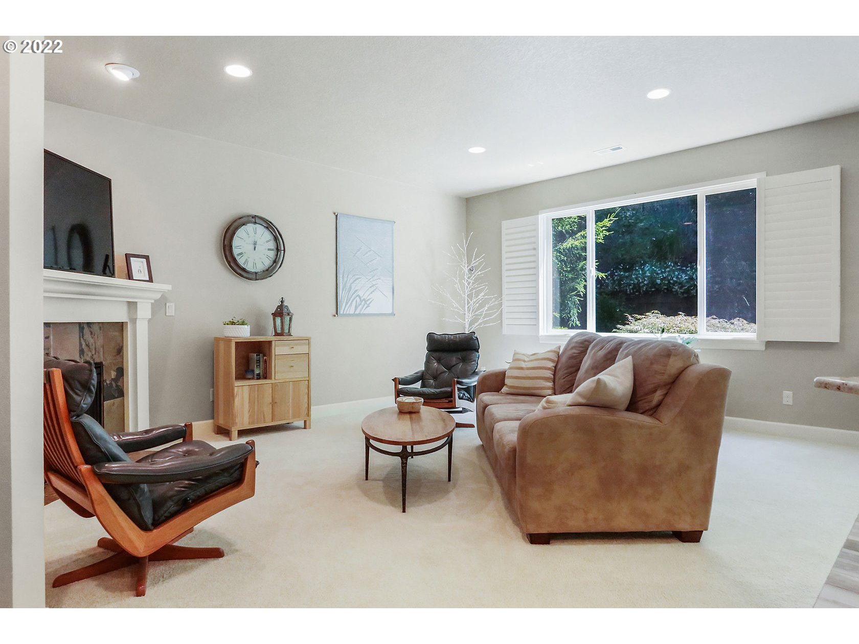 1773 Joseph Fields Street West Linn, OR 97068 - Photo 7 of 32 a living room with fireplace furniture and a large window