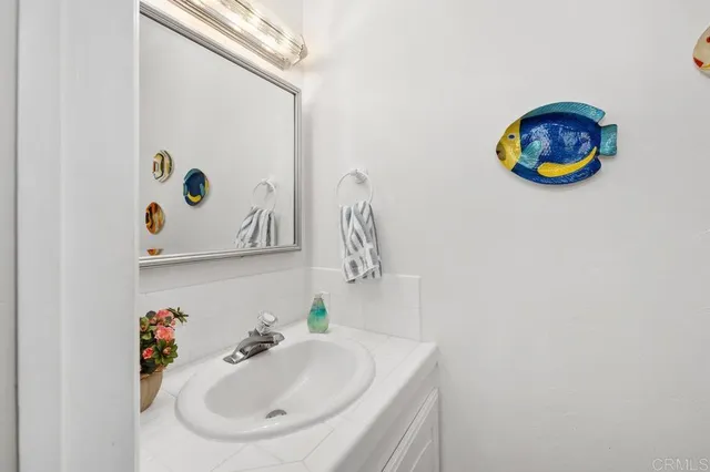 a view of a bathroom with wooden floor