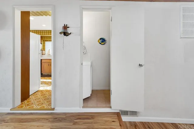a view of a storage & utility room with washer and dryer