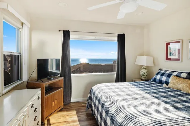 a spacious bathroom with a double vanity sink and mirror