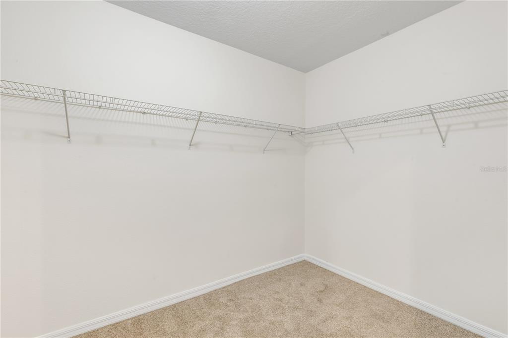 48 Hickory Loop Ocala, FL 34472 - Photo 27 of 52 a view of a room with racks on the wall