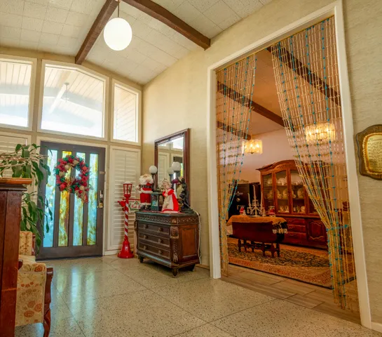 a view of living room with furniture and toys