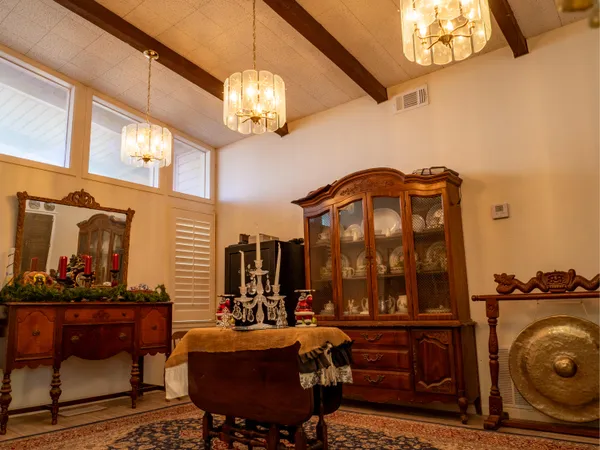 a view of a dining room with furniture