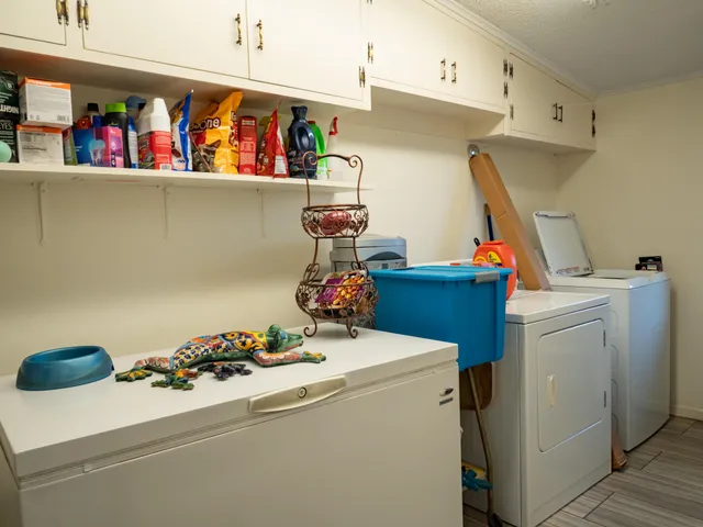 a utility room with dryer and washer
