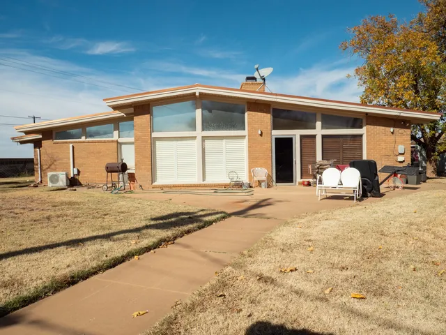 a view of a house with a snow