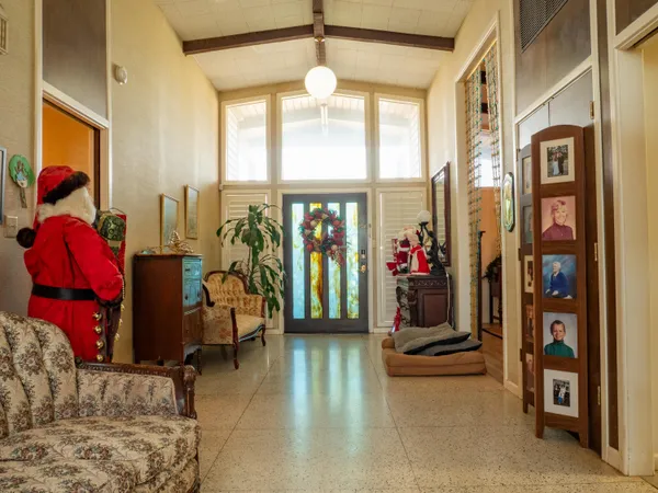 a view of gym equipment and windows