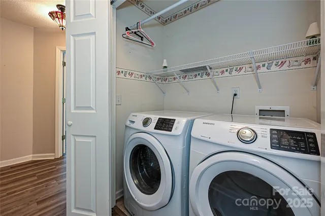 a view of washer and dryer in a utility room