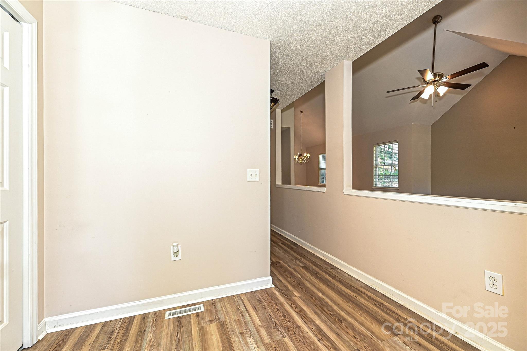 7705 Red Robin Trail Denver, NC 28037 - Photo 2 of 27 a view of a hallway with a window