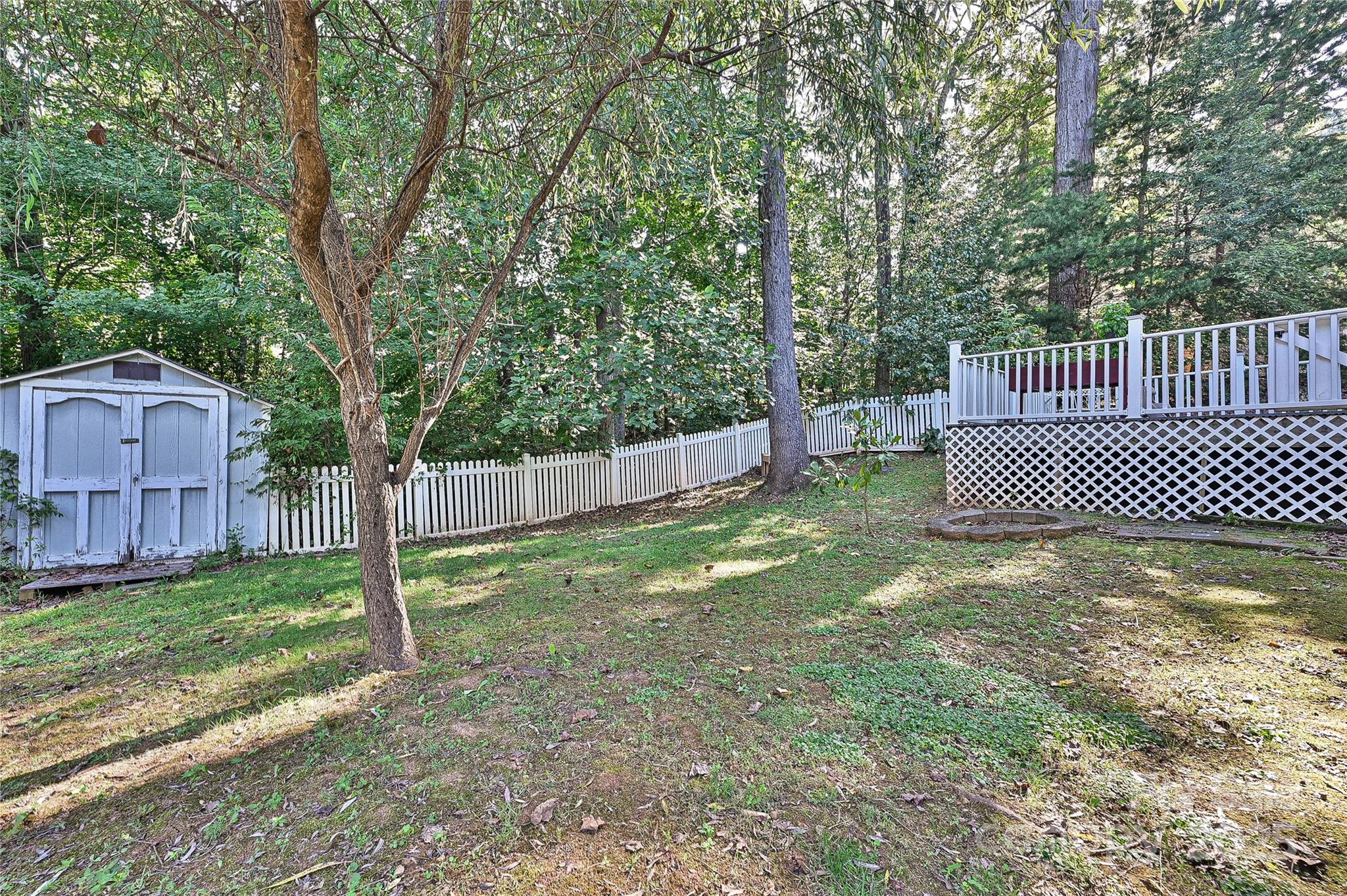 7705 Red Robin Trail Denver, NC 28037 - Photo 24 of 27 a view of a backyard with wooden fence