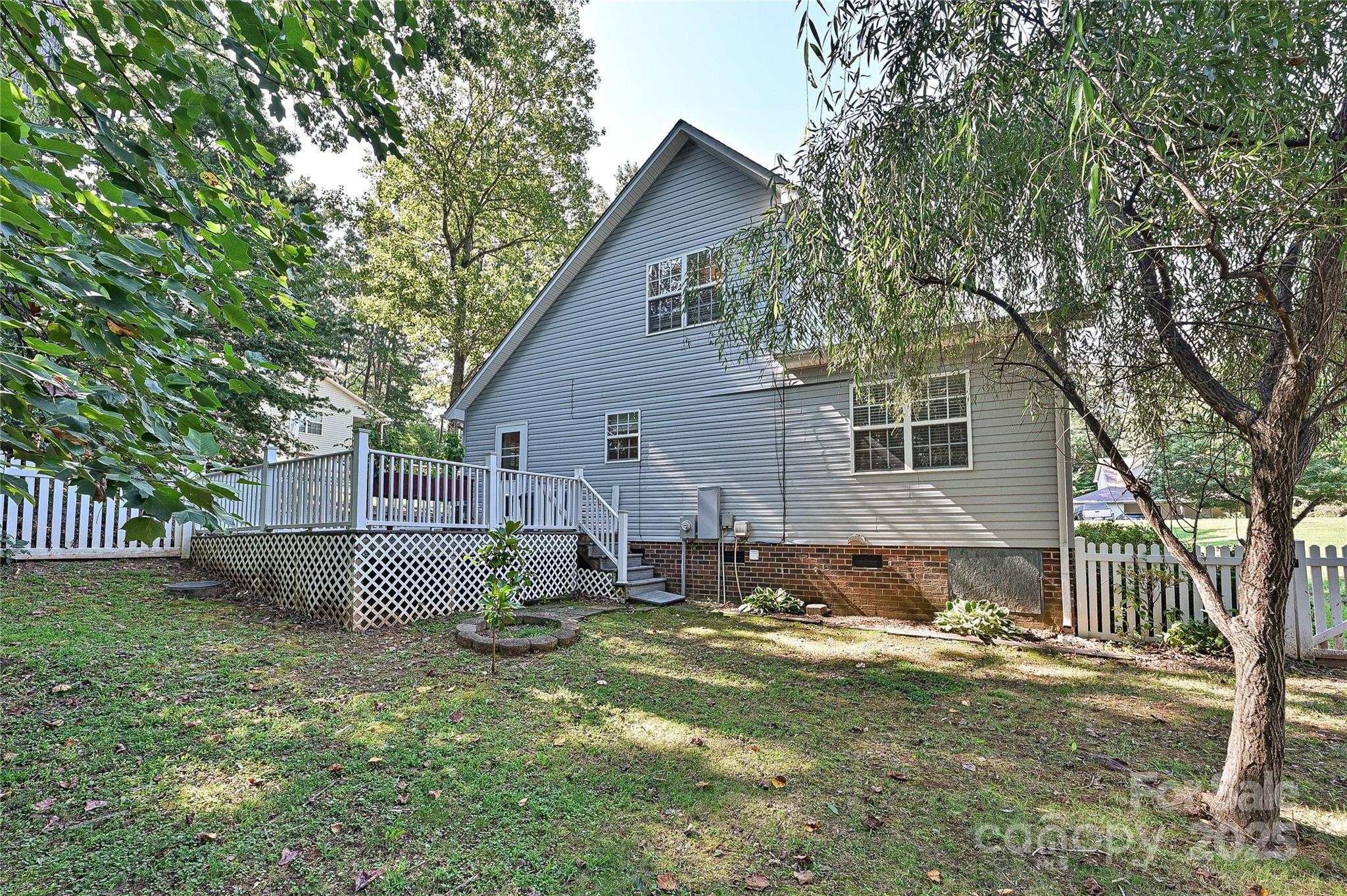 7705 Red Robin Trail Denver, NC 28037 - Photo 25 of 27 a view of a house with a yard