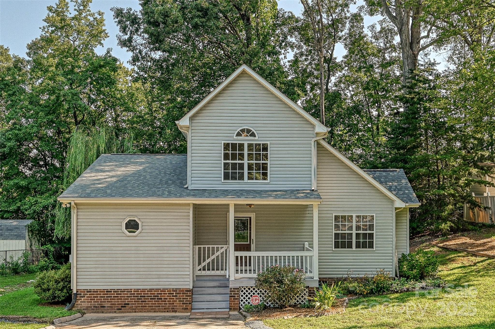 7705 Red Robin Trail Denver, NC 28037 - Photo 26 of 27 a front view of a house with a yard