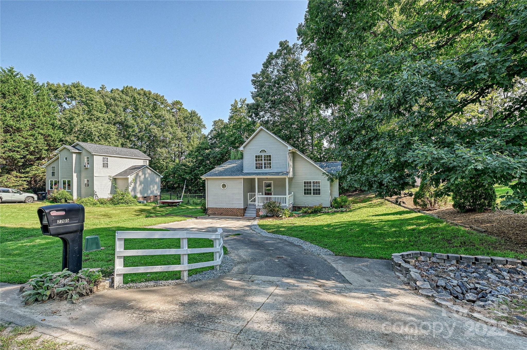 7705 Red Robin Trail Denver, NC 28037 - Photo 27 of 27 a front view of a house with a yard