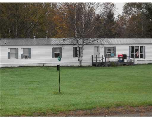 654 Shin Pond Road Patten, ME 04765 - Photo 1 of 7 Exterior Front.