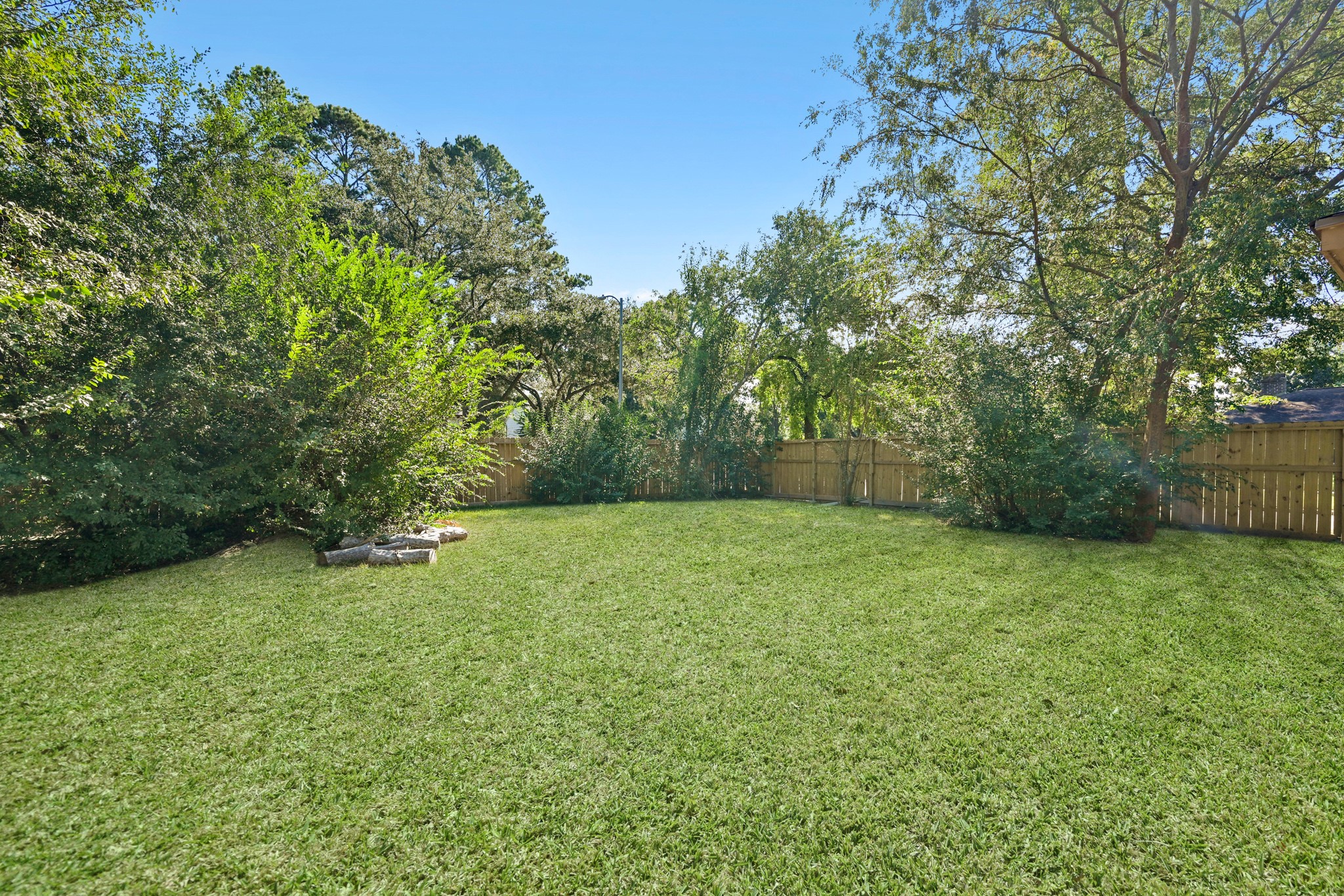 19302 Pocito Court Humble, TX 77346 - Photo 22 of 28 View of the yard from the backside of the home.