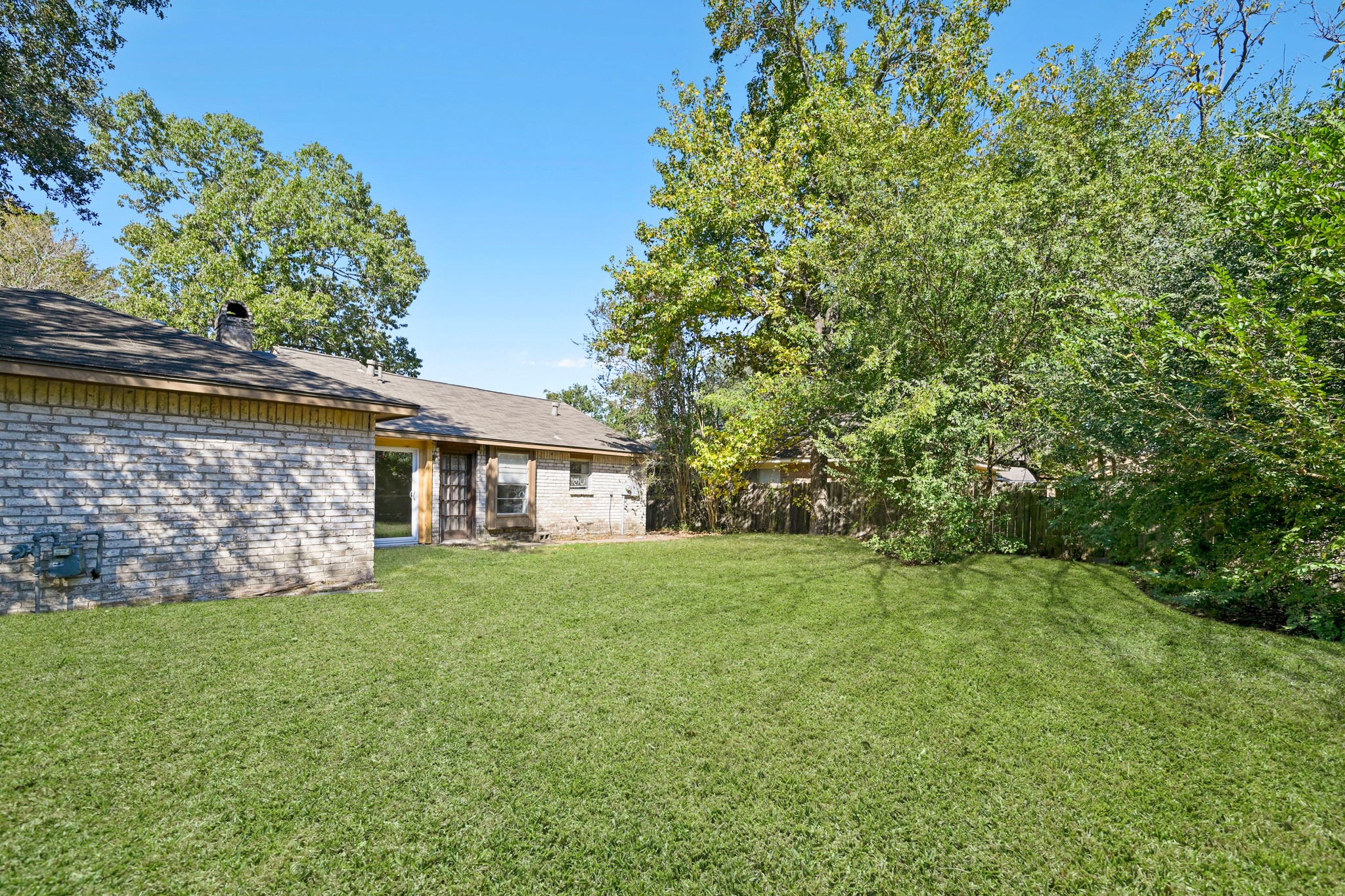 19302 Pocito Court Humble, TX 77346 - Photo 23 of 28 Another view of the backyard of the home.