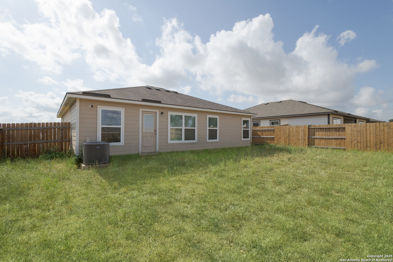 16025 Dickens Lytle, TX 78052 - Photo 15 of 15 a view of a house with garden