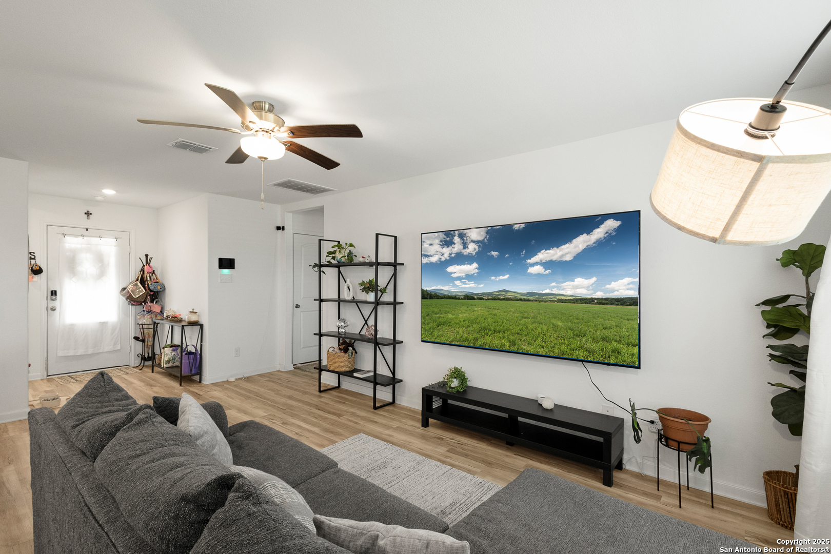 16025 Dickens Lytle, TX 78052 - Photo 5 of 15 a living room with furniture and a flat screen tv