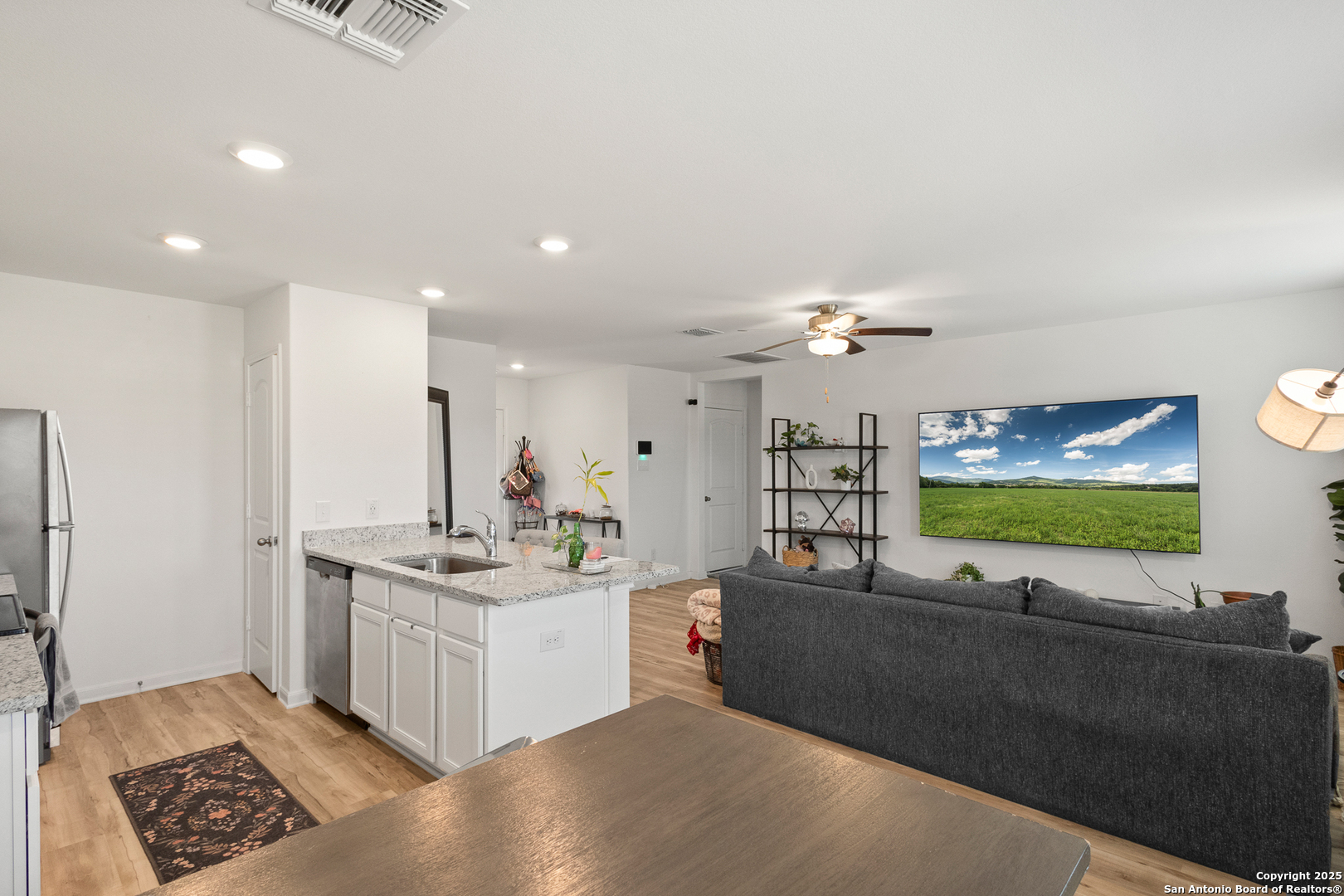 16025 Dickens Lytle, TX 78052 - Photo 8 of 15 a living room with furniture and a flat screen tv