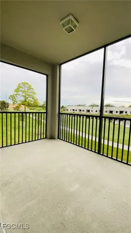 a view of multiple houses with swimming pool