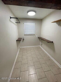4315 41st Street Lubbock, TX 79413 - Photo 6 of 14 a view of a utility room with windows