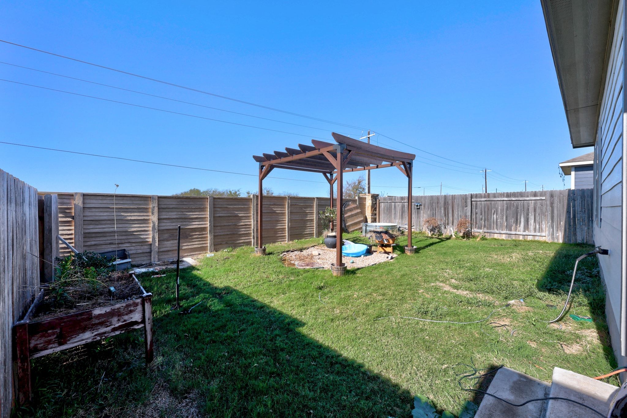 225 Unforgiven Lane Jarrell, TX 76537 - Photo 26 of 30 View of fenced backyard