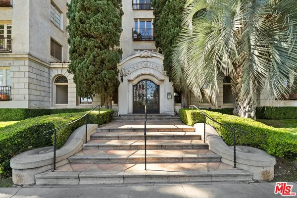 a view of a building with a porch