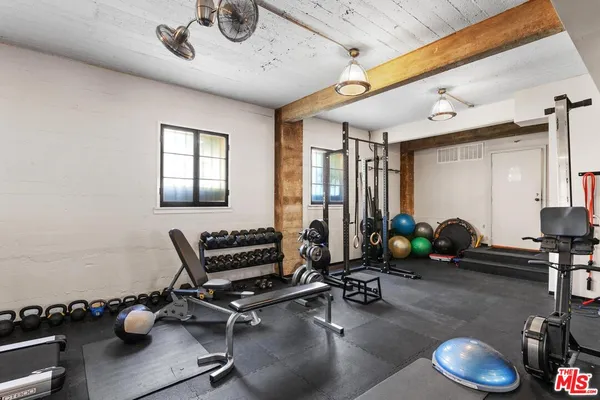 a view of a room with gym equipment