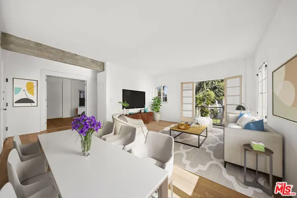 a living room with furniture or couch and a flat screen tv