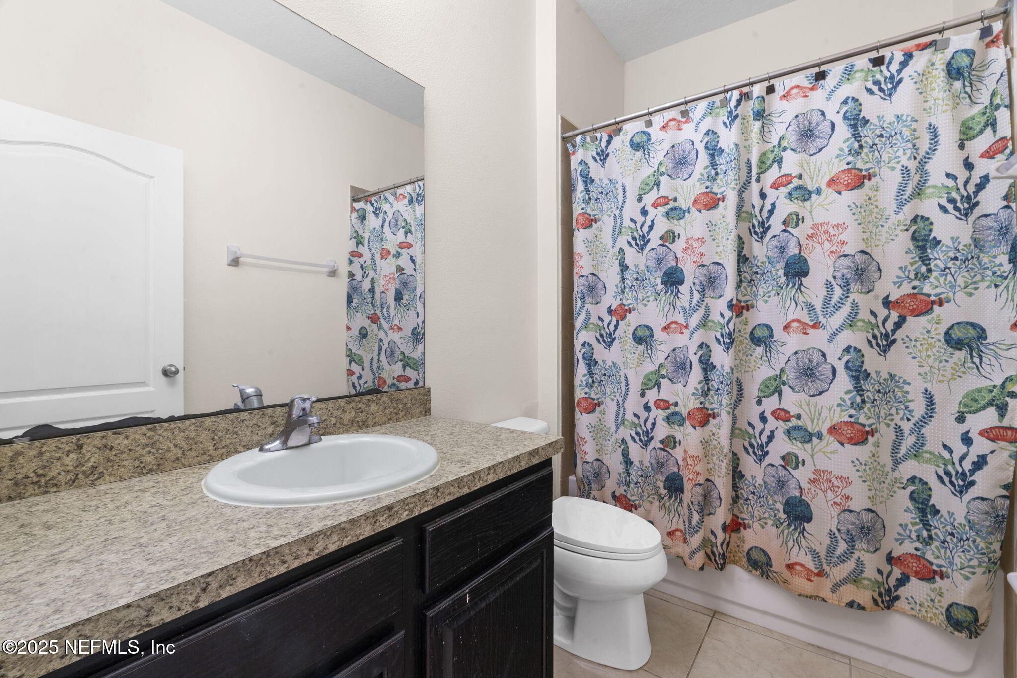 28 Riachuelo Lane St. Augustine, FL 32095 - Photo 11 of 90 a bathroom with a granite countertop sink a toilet and a mirror