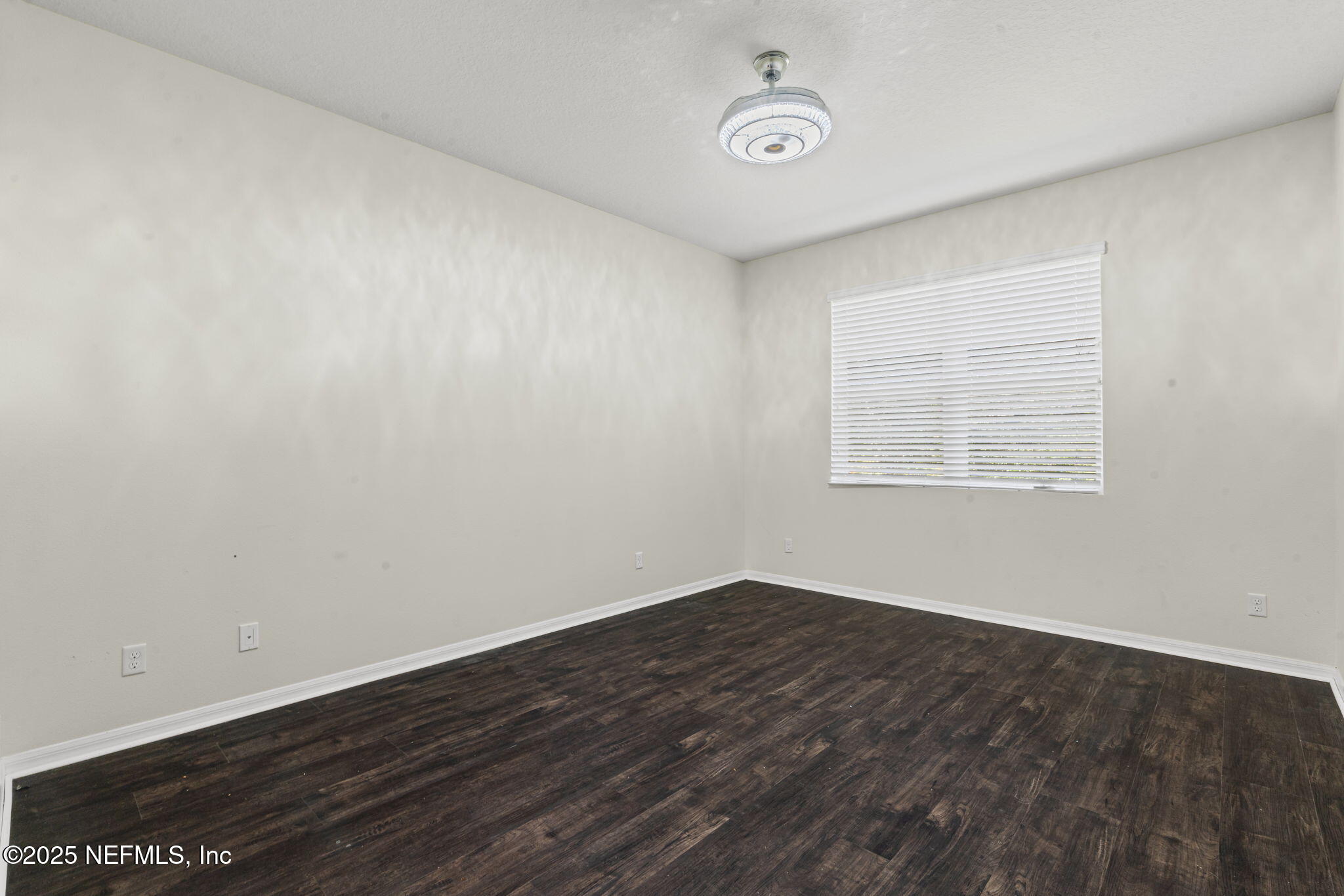 28 Riachuelo Lane St. Augustine, FL 32095 - Photo 32 of 90 an empty room with wooden floor and windows