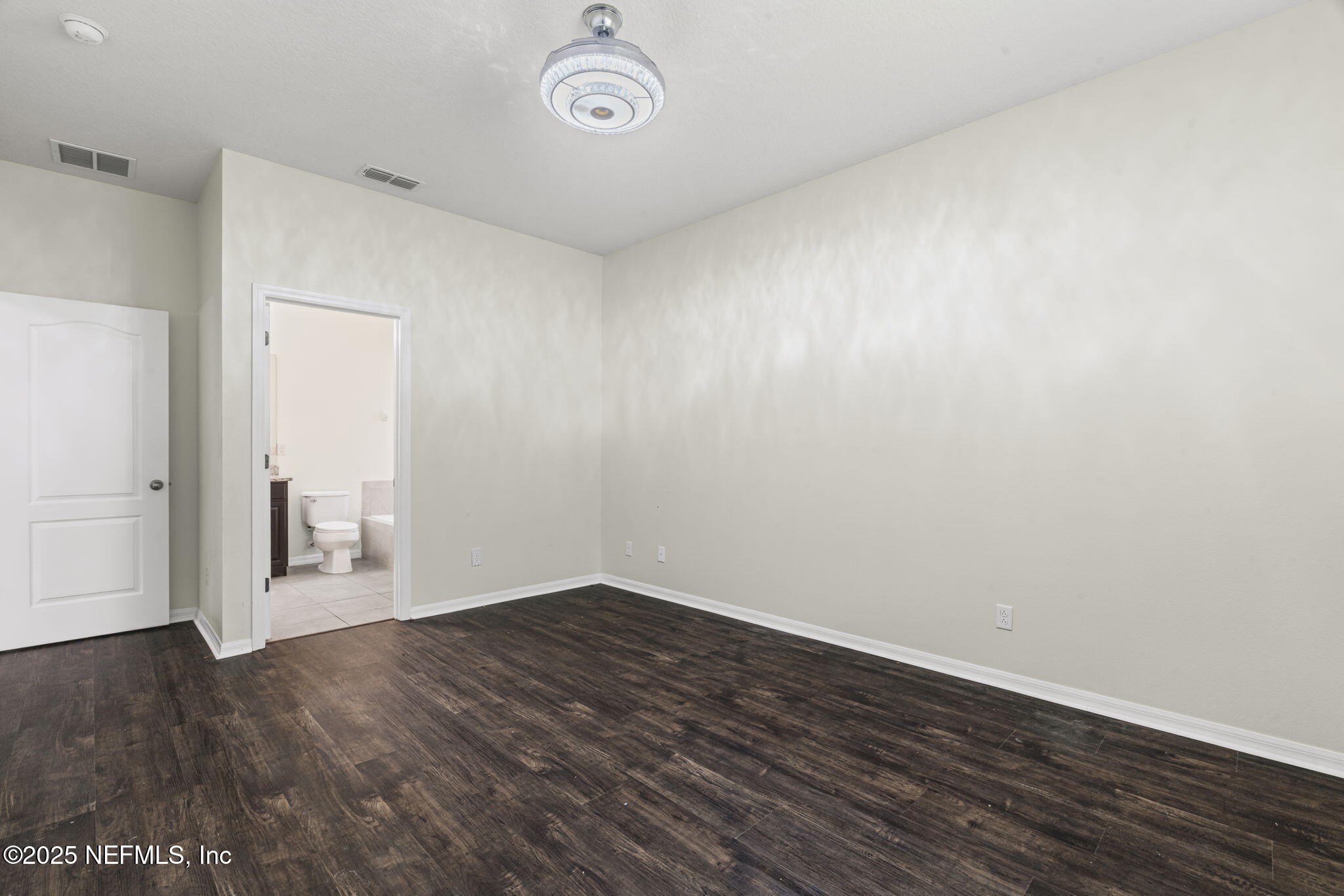 28 Riachuelo Lane St. Augustine, FL 32095 - Photo 34 of 90 a view of an empty room with wooden floor