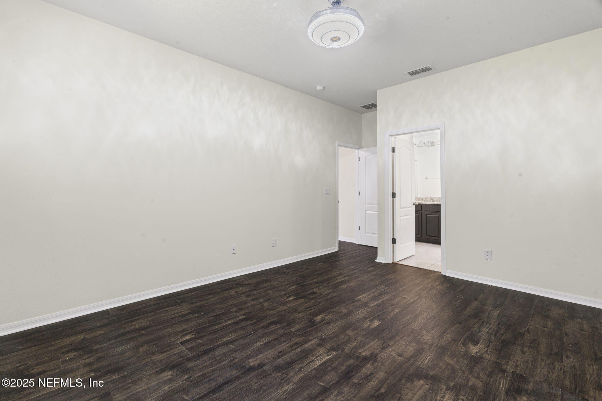 28 Riachuelo Lane St. Augustine, FL 32095 - Photo 35 of 90 an empty room with wooden floor