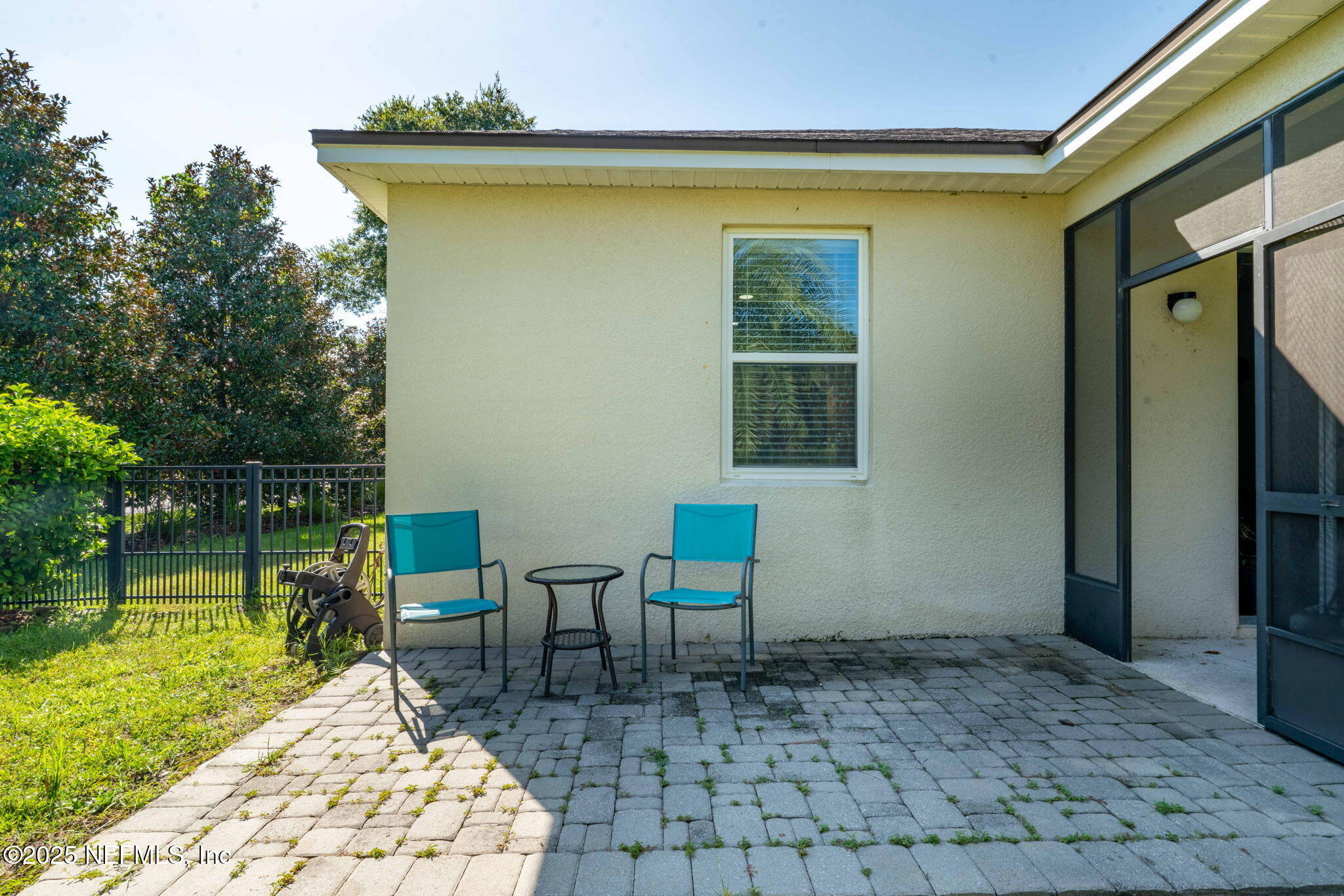 28 Riachuelo Lane St. Augustine, FL 32095 - Photo 48 of 90 a backyard of a house with lake view and a potted plant