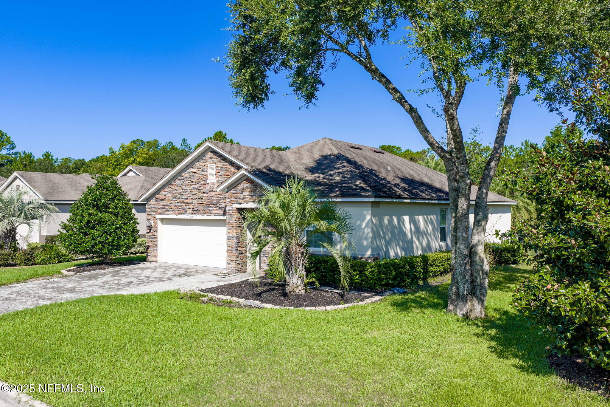 28 Riachuelo Lane St. Augustine, FL 32095 - Photo 59 of 90 a front view of a house with garden