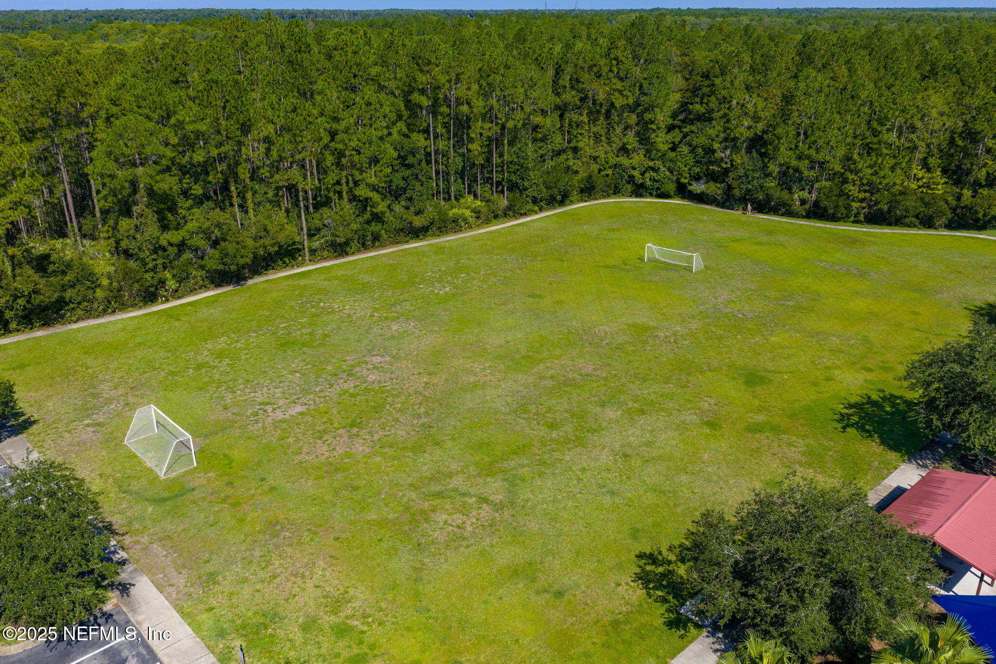 28 Riachuelo Lane St. Augustine, FL 32095 - Photo 77 of 90 a view of a large pool with a yard