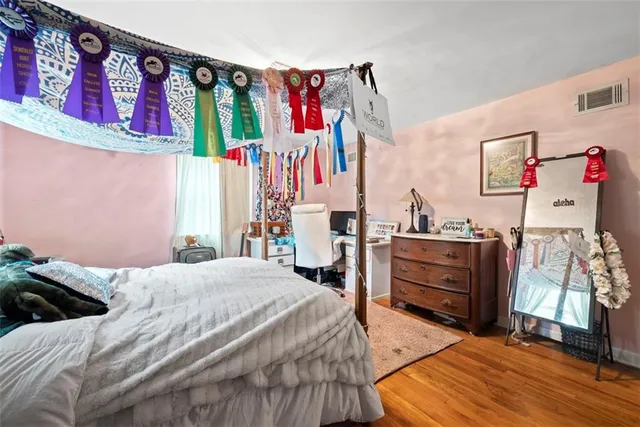 a bedroom with a bed and a closet