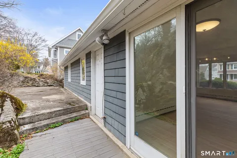a view of a porch with a door and a porch