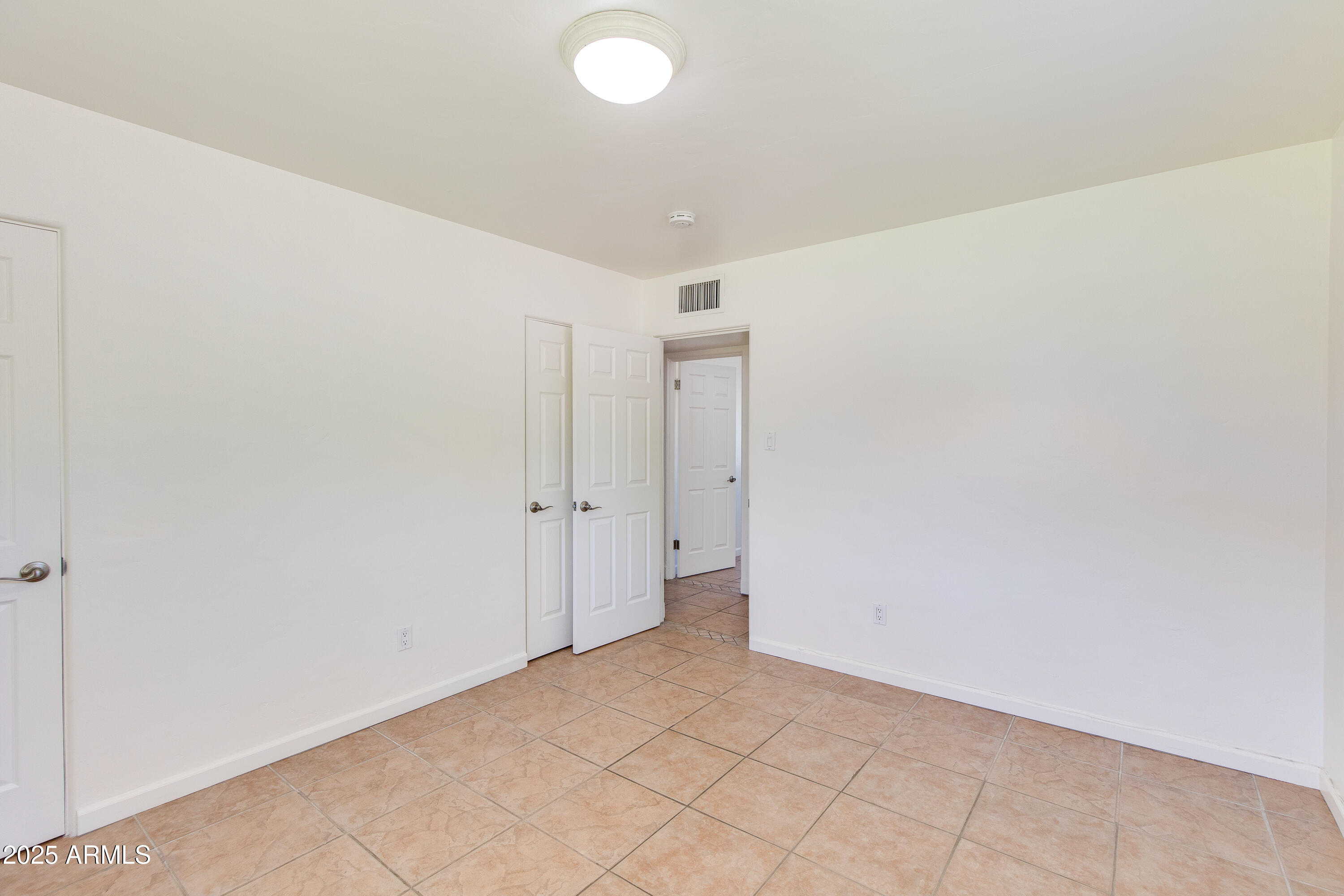 4808 North 29th Place Phoenix, AZ 85016 - Photo 13 of 18 a view of an empty room