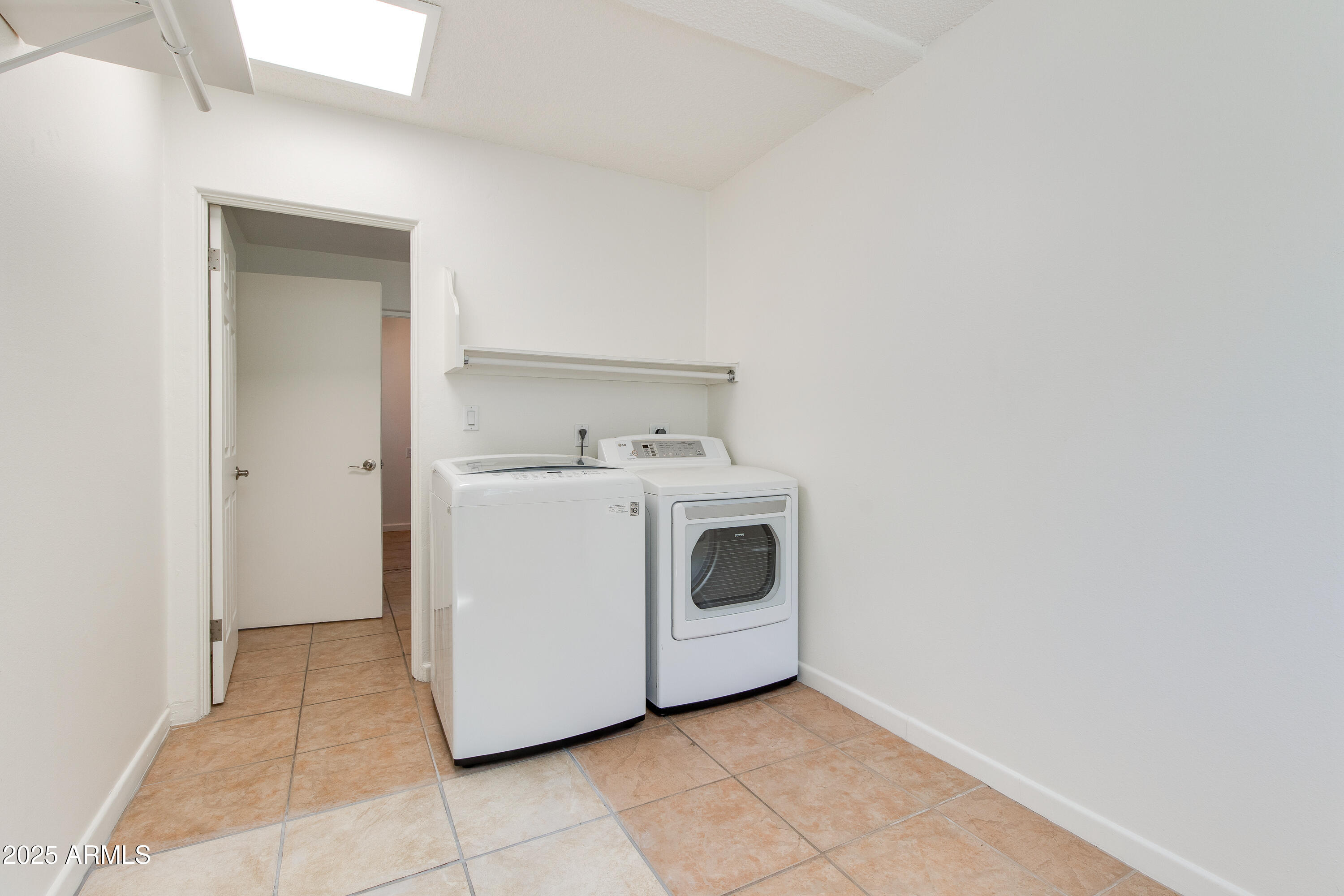 4808 North 29th Place Phoenix, AZ 85016 - Photo 16 of 18 a utility room with dryer and washer
