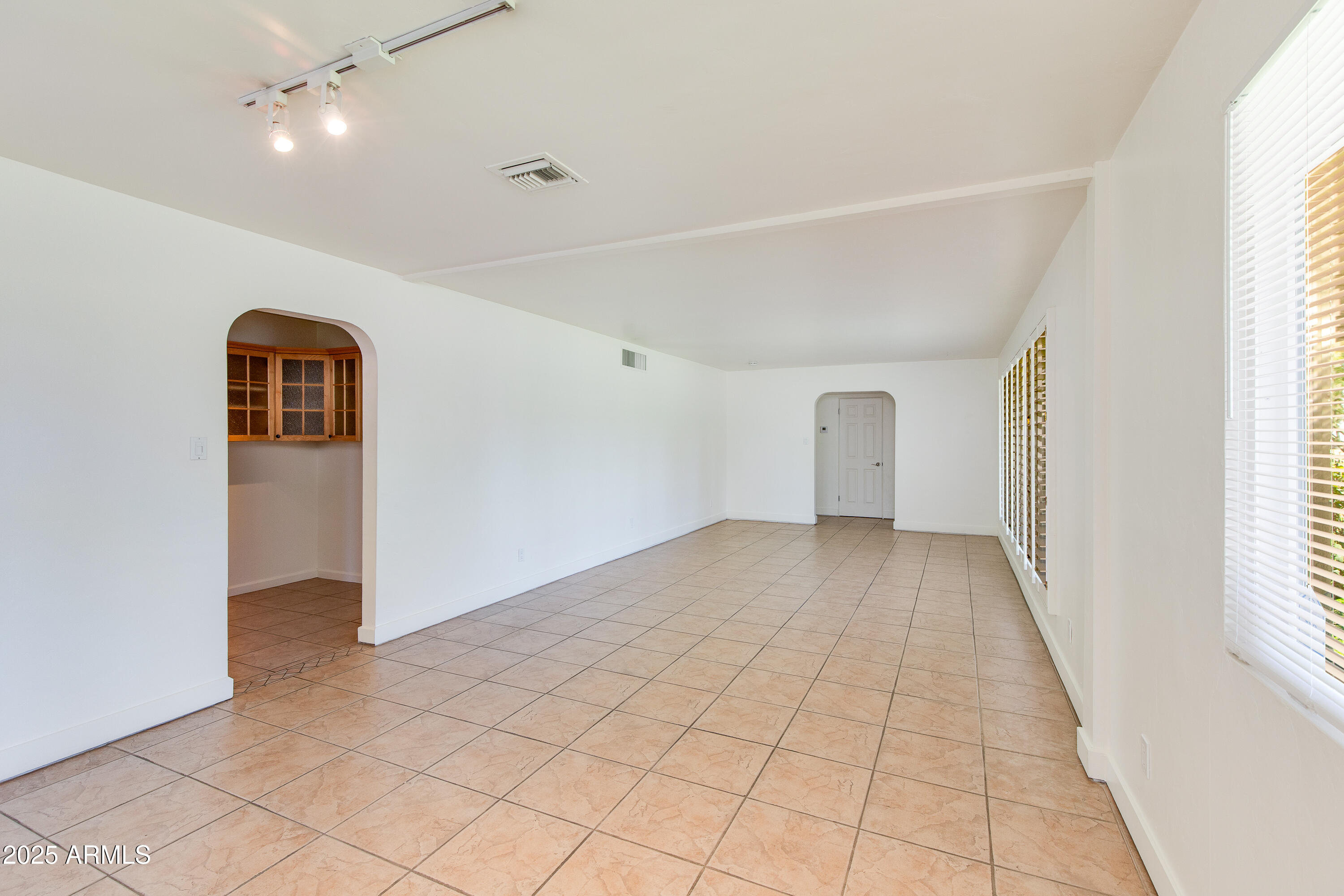 4808 North 29th Place Phoenix, AZ 85016 - Photo 3 of 18 a view of an empty room