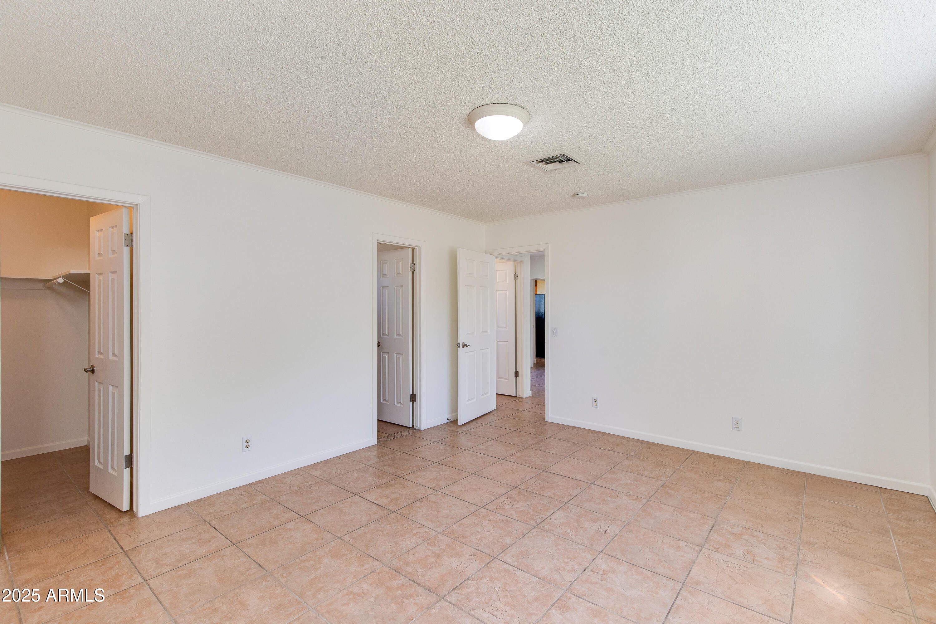 4808 North 29th Place Phoenix, AZ 85016 - Photo 7 of 18 a view of an empty room