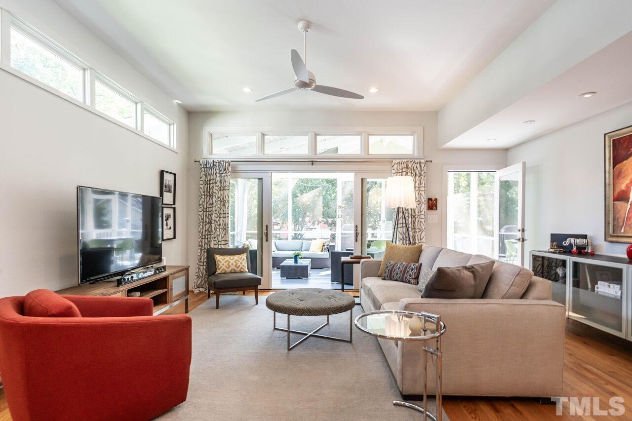 1210 Filmore Street Raleigh, NC 27605 - Photo 13 of 33 a living room with furniture and a flat screen tv