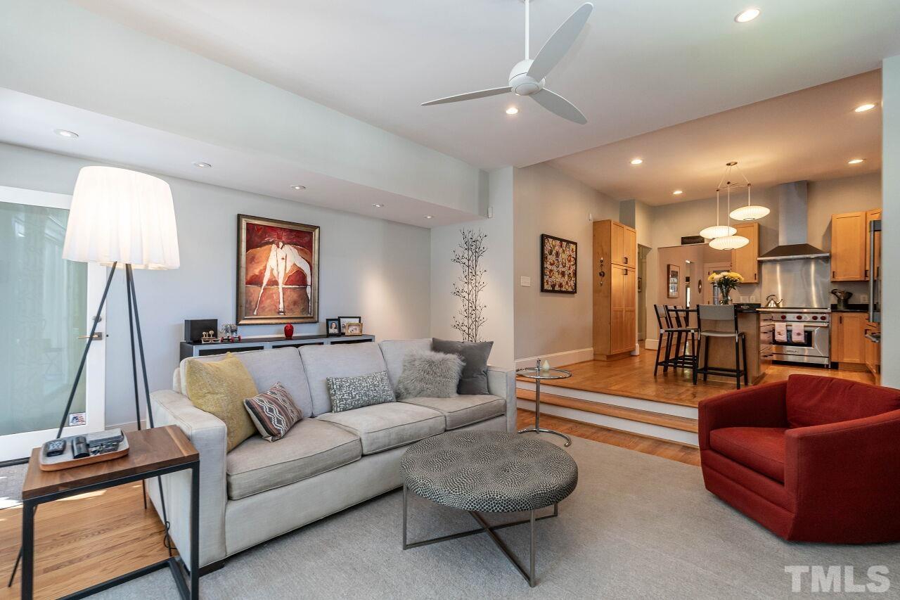 1210 Filmore Street Raleigh, NC 27605 - Photo 16 of 33 a living room with furniture and a flat screen tv
