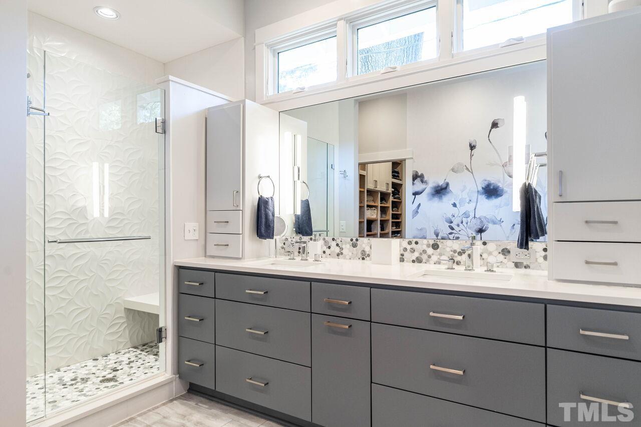 1210 Filmore Street Raleigh, NC 27605 - Photo 19 of 33 a bathroom with a sink and a mirror