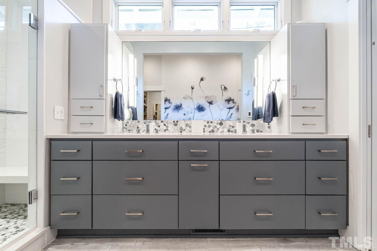 1210 Filmore Street Raleigh, NC 27605 - Photo 20 of 33 a bathroom with a sink vanity and mirror