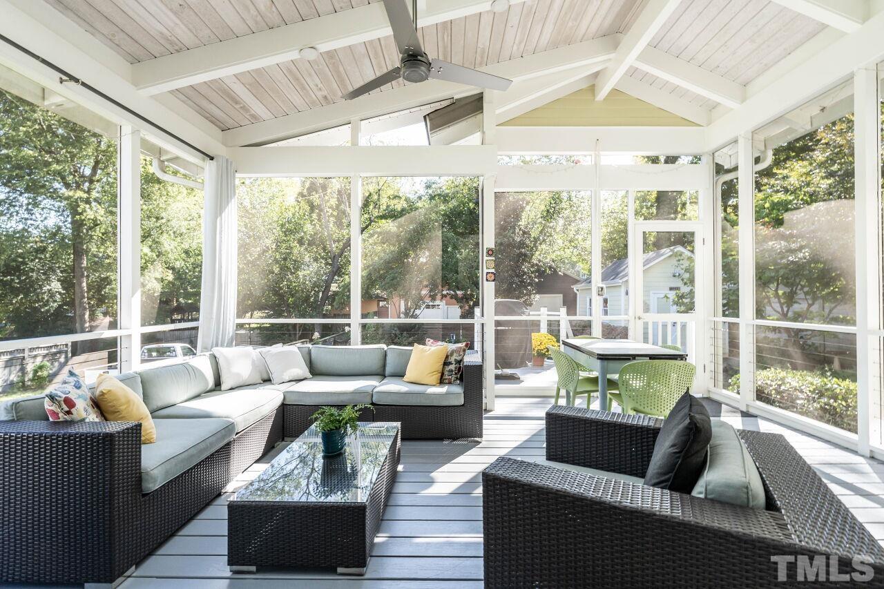 1210 Filmore Street Raleigh, NC 27605 - Photo 27 of 33 a living room with furniture and a large window