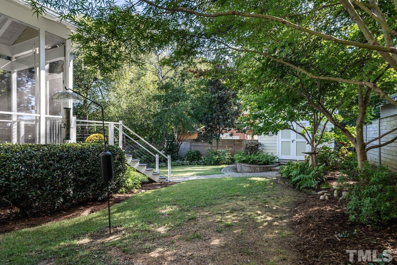 1210 Filmore Street Raleigh, NC 27605 - Photo 29 of 33 a view of a house with a backyard