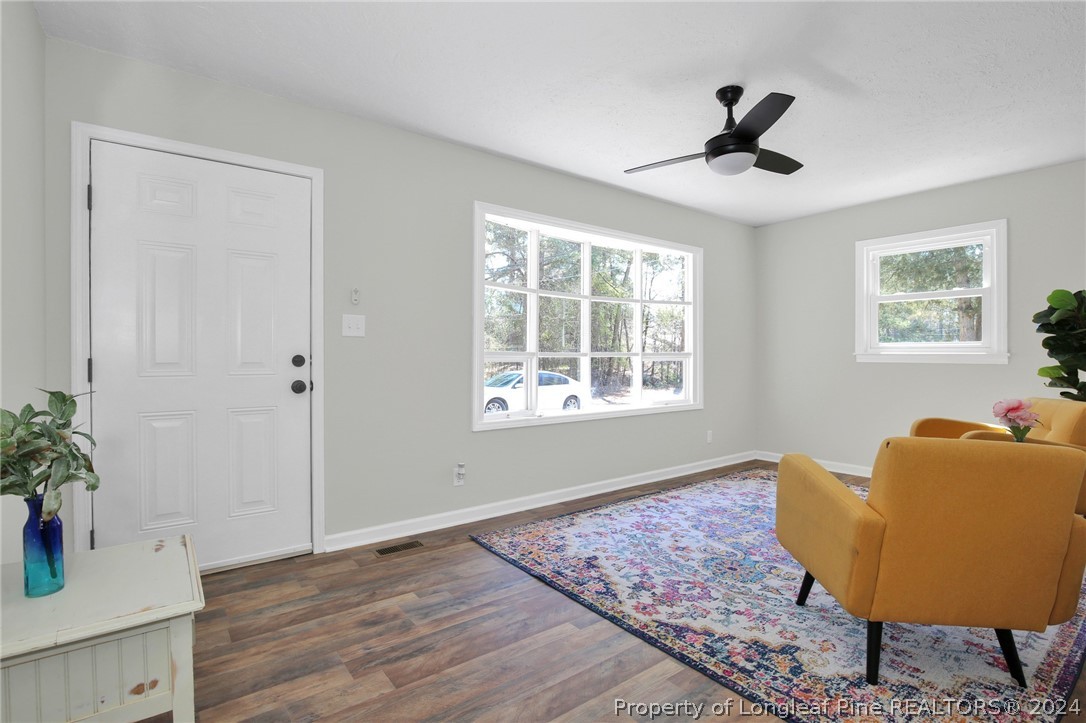 2714 George Owen Road Fayetteville, NC 28306 - Photo 3 of 12 a living room with furniture and a window