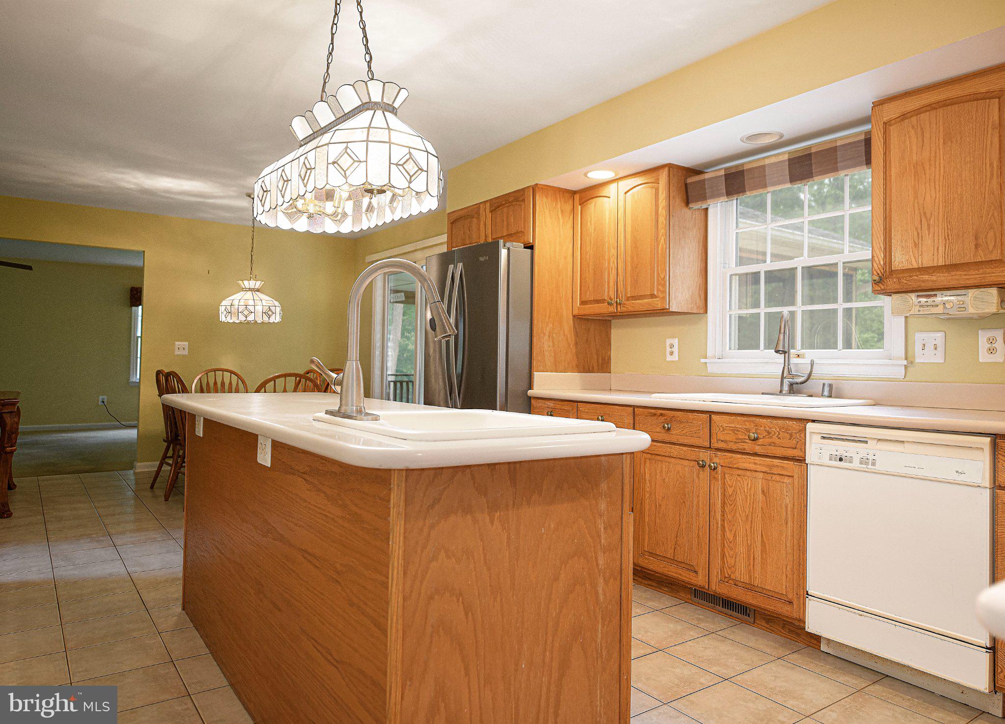 711 Gilbert Road Aberdeen, MD 21001 - Photo 4 of 54 a kitchen with a sink stove and refrigerator