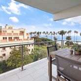 a view of a balcony with city view